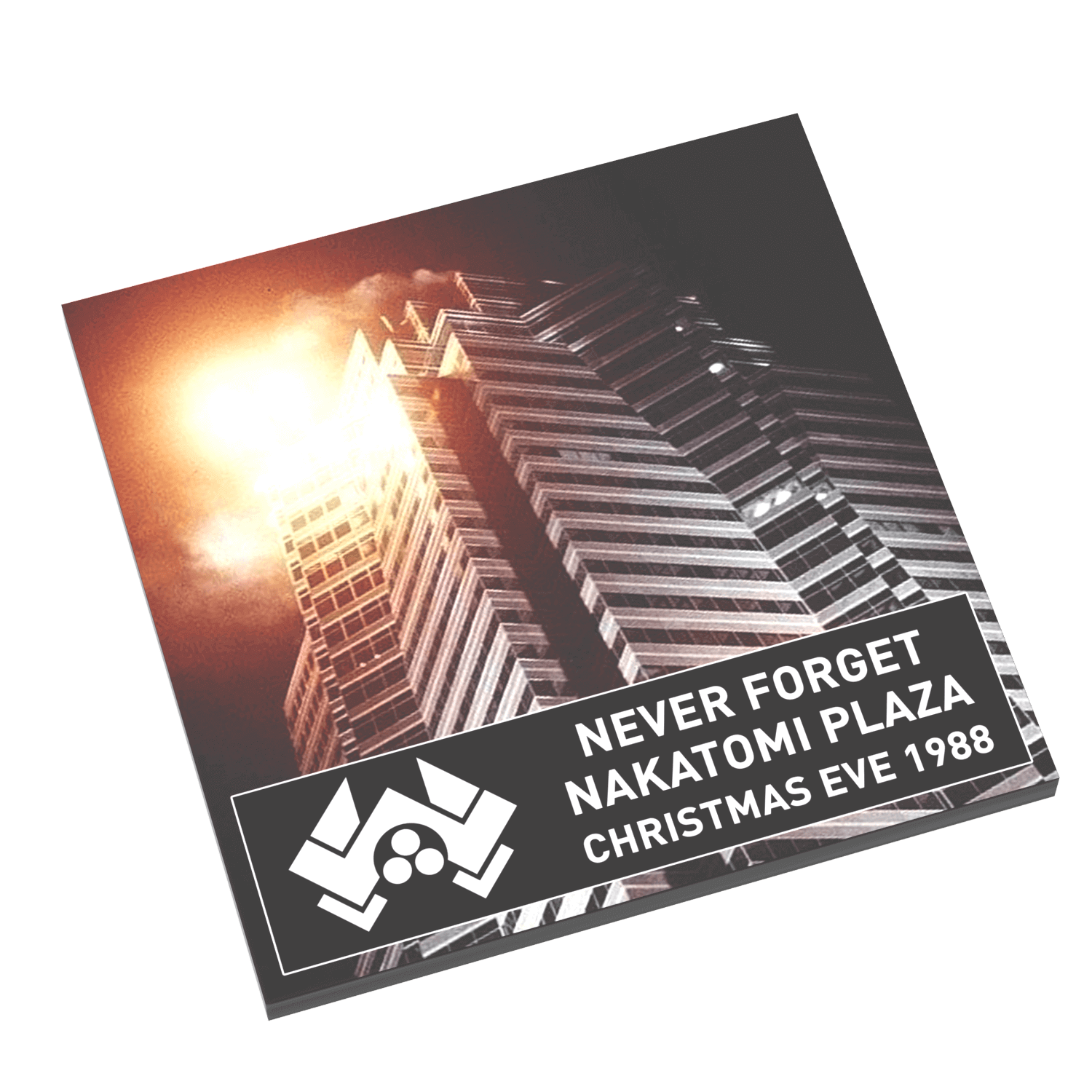 Die Hard Movie poster for 'Never Forget Nakatomi Plaza Christmas Eve 1988' with a building and text.